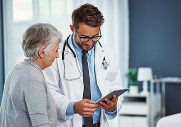 doctor with elderly woman